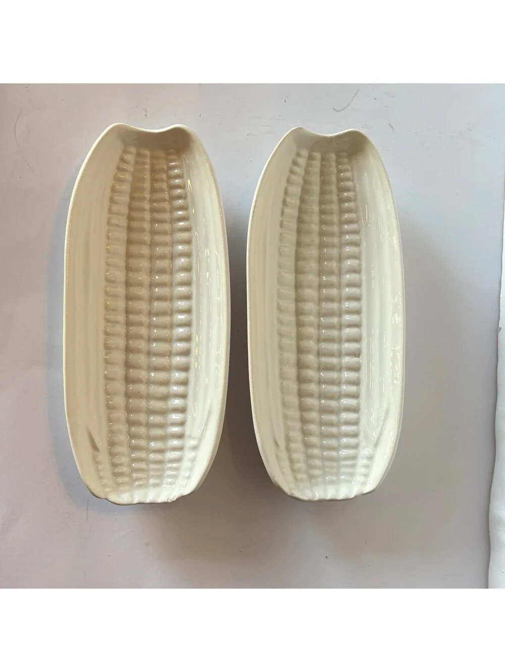 WHITE STONEWARE CORN ON THE COB HOLDERS SET OF FOUR